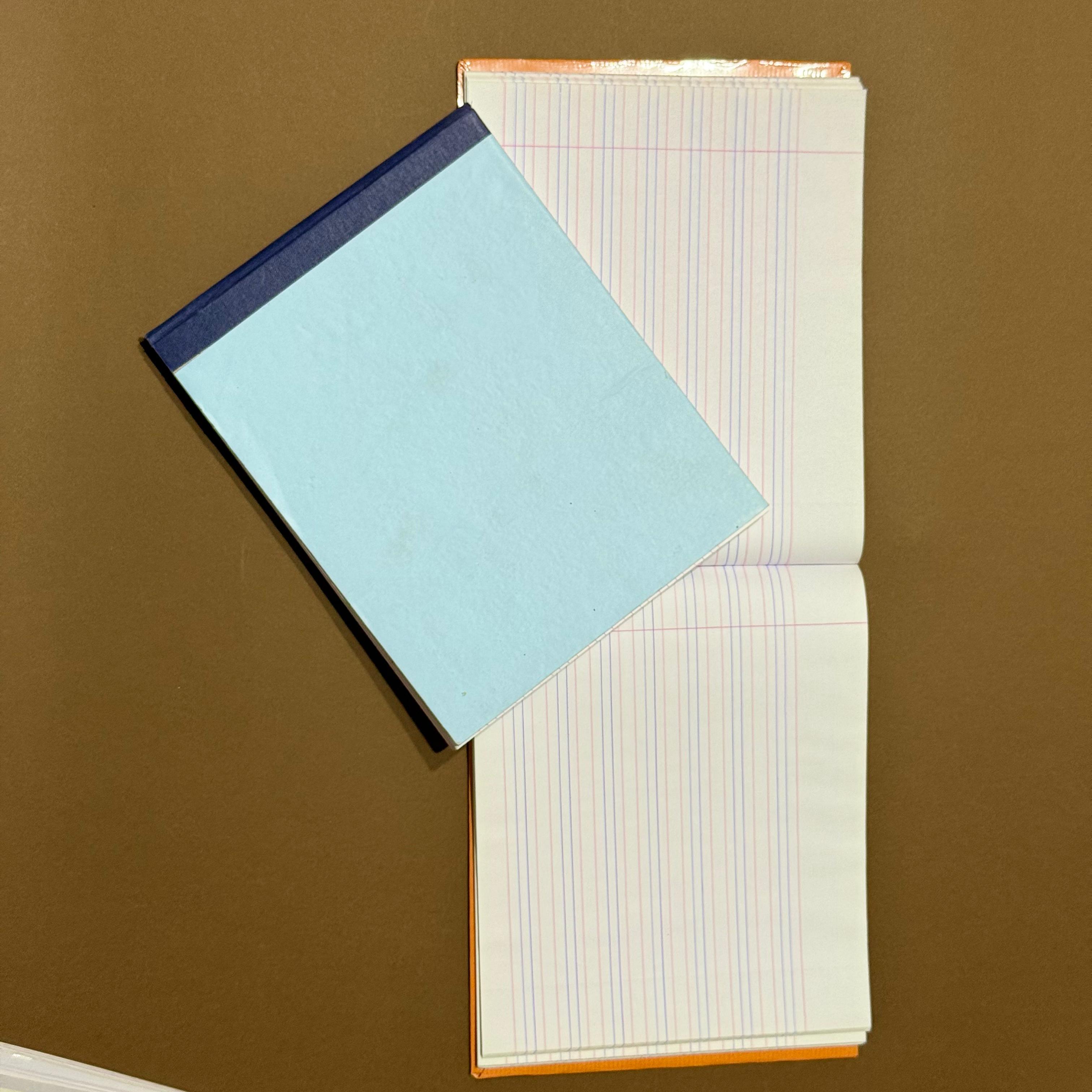 XAV- Hard Bound Four Line Notebook